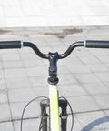 Front view of bike with Aluminum 25.4mm Handlebar Riser 80mm Rise, 520mm Long For Fixed Gear And Road Bikes, black finish visible