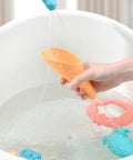 5 Piece Beach Sand Set For Kids And Boys Portable Lightweight Plastic Shovels And Buckets Water Play Kit in use