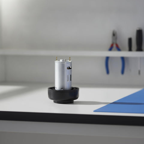 Heavy Duty Micro DC 390 High Speed Electric Motor For Vacuum Cleaner Upgrade with metallic housing on a workbench.