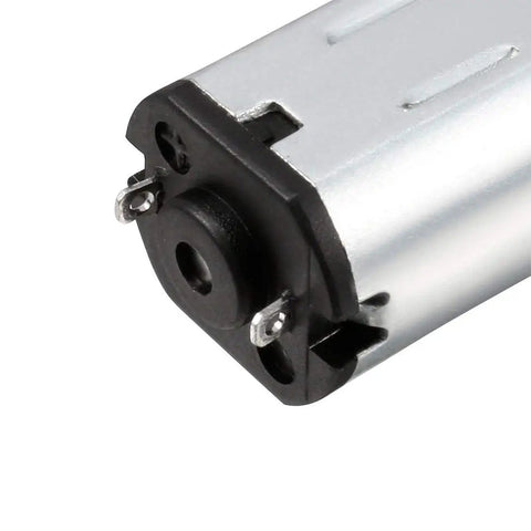 Close-up of Two Pack DC Micro Gearbox Motors 3V 100 RPM N20, 17x12mm Body With 10x3mm Shaft, showing metal gear train detail