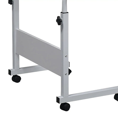 Kick Back And Crush Your Daily Grind With This Adjustable Standing Computer Desk Featuring Smooth Locking Wheels And A Foldable Rolling Laptop Table Built For Cozy Living Room Setups, showcasing steel frame and rolling casters.