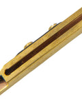 Close-up of Straight Line Muzzleloader Capper for 11 Caps with solid brass construction, focusing on the spring-loaded cap tube.