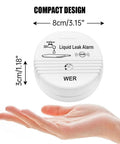 Water Leak Alarm Sensor Battery Operated 90dB Leak Detector showing compact 8cm design size above a hand