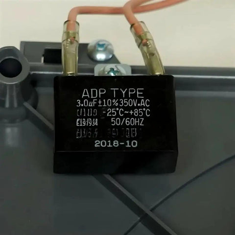 Heavy Duty Draft Inducer Motor Replacement For Gas Furnace 115 Volt 1.16 Amp 3 Prong Plug capacitor component close-up image.