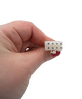 Hand holding pin connector of Freezer Drawer Ice Maker Assembly Replacement For DA97-07603B Not Universal Model Specific