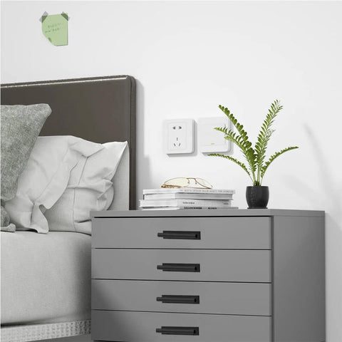 10 Pack Self Stick Push Pull Helper ABS Plastic Wardrobe Handles for cabinets, shown on a grey bedside drawer in a bedroom setting.