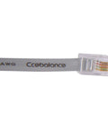 Close-up of a 26 AWG Ethernet cable with clear connector, labeled 'Ccobalance'