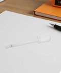 Transparent pipette from Fountain Pen Flusher Kit With Precise Nib Flush Pipette For Ink Removal And Cleaning on a desk
