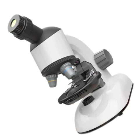 Kid Friendly Microscope Kit With High Definition Magnifier And LED Light for educational science exploration on white surface.