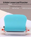 6 Hole Punch Handheld Metal Craft Tool For Binding Notebooks And Scrapbooks, with blue handle, 5 sheet capacity, on white surface