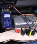 EV Motor Tester Deenergized Circuit Analysis Diagnostics Speedy Static And Dynamic Scans with clamps on car engine for diagnostics.