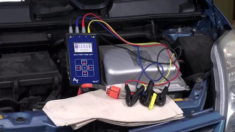 EV Motor Tester Deenergized Circuit Analysis Diagnostics Speedy Static And Dynamic Scans with clamps on car engine for diagnostics.
