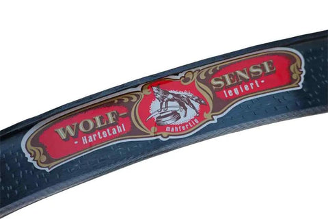 Label of Wolf Sense Scythe Blade 70cm By 50mm Hand Forged In Austria With Double Peen Ready To Use Sharp 25 Inch Edge