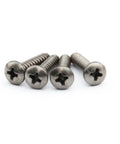 Badass Phillips Head Self Tapping Bolts With Round Tops Tough As Nails Iron Construction For Rough Build Projects Assorted Metric Sizes M3 Through M6 6mm To 30mm Length Quick Install Fasteners Come In A Five Piece Pack For Any Garage Or Workshop Hobby - Close-up of four steel bolts showcasing Phillips heads.