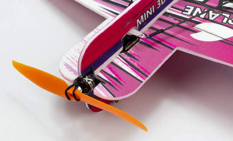 Close-up of a pink Indoor Micro RC Plane Kit Sakura 3D F3P For Indoor Flight 420mm Wingspan with orange propeller.