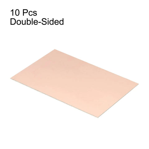 Image showing Double Sided FR4 Copper Clad PCB Boards 100 X 70 mm 0.8 mm Thick 10 Pack for DIY electronics and prototyping.
