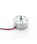 6V 6500 RPM Micro DC Electric Motor With A Tough As A Nail Build And Silky Smooth Spin Designed For Smart Locks Mini Fans And DIY Crafts Offering No Fuss Reliability Daily And Long Term Durability, side view with exposed wires.