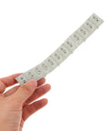 Hand holding 2 Pack Conductive Rubber Contact Strips For Keyboard Buttons And Digital Pianos, Silicone Key Contact Pads, Repair Kit