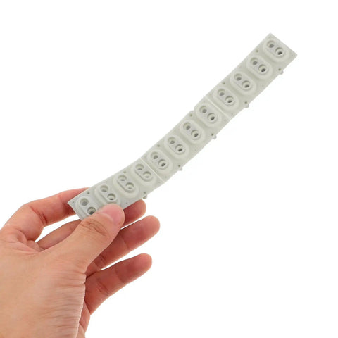 Hand holding 2 Pack Conductive Rubber Contact Strips For Keyboard Buttons And Digital Pianos, Silicone Key Contact Pads, Repair Kit