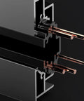 Sleek Concealed Power Track Socket Offering Four Dedicated Plug Outlets For Lowkey Kitchen Counter Organization And Modern Home Electrical Flexing Heavy Duty Sandblasted Aluminum Finish close-up of internal connections.