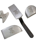 Set of four silver and black scraper tools with warning labels on blades.