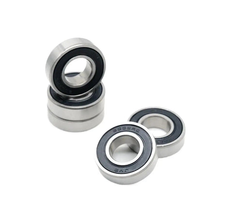 Top Notch Double Sealed Deep Groove Ball Bearings 6004RS Set Of 2, featuring ABEC 7 precision, shown from multiple angles.