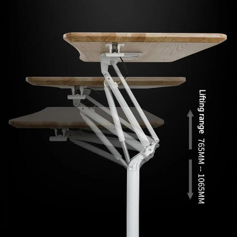 Hella Stable Mobile Standing Desk Featuring Instant Gas Spring Lift And Smooth Glide Rollers For A Total Game Changer Home Office Upgrade Or Flexible Workspace Setup In Clean Black, with adjustable height mechanism.
