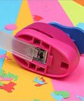 Spring Action Five Eighth Inch Circle Paper Punch For Crafting on colorful paper background with cut-out shapes