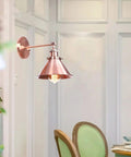 Heavy Duty Adjustable Wall Sconce Featuring Straight Up Industrial Design Foolproof Mounting E27 Base Solid Bronze Glow Ideal For Reading Lounge Bath Or Guest Room In Rich Red Tone in matte copper finish with exposed light bulb