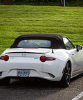 Stubby Antenna For Mazda Miata 2006-2026, 3.8 Inch Short Antenna Replacement, shown on white Mazda Miata parked outdoors
