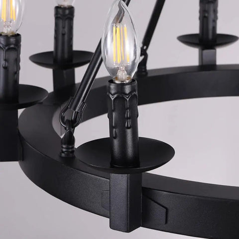 Close-up of Black Farmhouse Wagon Wheel Chandelier With Eight Exposed Lights Dope Industrial Iron Ceiling Fixture In Candle Style