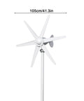 Front view of a white six-blade wind turbine generator on a tall pole.