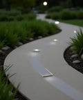 In-ground LED pathway with 95 Inch In Ground LED Aluminum Channel Kit 2 Pack For Outdoor Walkways No Dig Install Waterproof Foot Traffic Rated Recessed Landscape Lighting Track With Ultra Slim 0.4 Inch Profile.