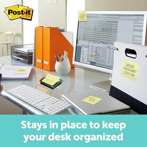 Pop-up sticky note dispenser with one 50-sheet canary yellow 3 in x 3 in pad, black base and clear lid desktop holder on desk