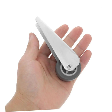Two Pack Sliding Door Roller Wheels Heavy Duty Galvanized Nylon Casters With No Sweat Setup in hand, showing smooth gliding and sturdy design.