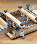 Five Pack Threaded Clamping Knobs For T Track And Table Saw Accessories in use on wood fixture with t-tracks, side view.
