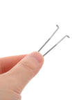 Upgrade Your Manicure Game With This 10Pcs Stainless Steel Torsion Spring Set For Toenail Clippers And Nail Nippers, Fast Install And Compact Salon Quality Gear To Fix Grooming Tools Like A Boss. two stainless steel torsion springs held by hand