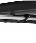 Close-up of No Fuss 4 Pack Quick Fix Roof Box Mounting Kit with universal quick release caliper clips on aero crossbar.