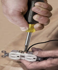 Hands using 10 In 1 Multi Bit Screwdriver And Nut Driver Tool With Heavy Duty Bits Including Phillips Slotted Square And Torx Interchangeable Blade