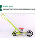Side view of Top Notch Precision Garden Seeder And Row Planter For Walk Behind Spreading Seed in Terraces with adjustable handle height