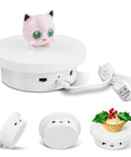 Motorized Rotating Display Stand 5.1 Inch 360 Photography Turntable For Tumbler Jewelry Epoxy Glitter Cup Electric Spinning Platform White Showpiece with a pink figure on top.
