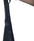 Top Tier Universal Toilet Plunger Carry Bag In Sleek Black held by hand, designed for every rubber cup size, perfect for travel.