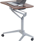 Adjustable Height Lectern Podium Stand With Laptop Desk Cart And Mobile Workstation Table For Conference Or Office Use Built Different For The Daily Grind Without Any Sweat, showing a mobile lectern with a wood surface and laptop.