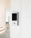 High End Oil Rubbed Bronze Touchscreen Deadbolt With Zwave Smart Home Link And Keyless Entry Crafted From Solid Brass mounted on a white wall.