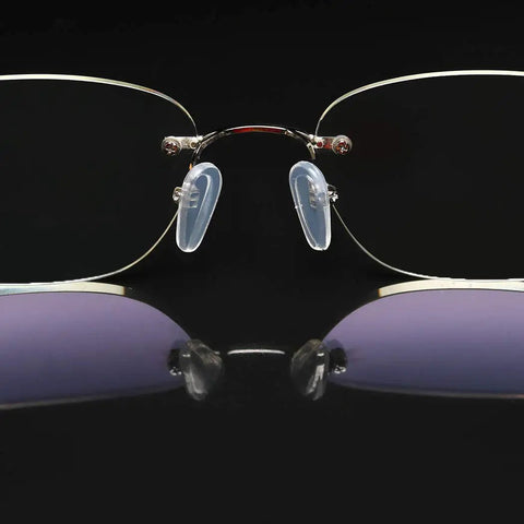 Super Comfy Silicone Airbag Glasses Nose Pads With Hella Soft Metal Support To Ditch Nose Pinch, clear silicone pads on metal frames.
