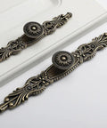 Antique Bronze Cabinet Pulls with Plate, 6.5 Inch Zinc Alloy Handles Set of Six, detailed design on white surface