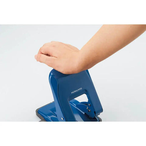 Heavy-Duty 2-Hole Punch With Smooth Action, Handles Up To 37 Sheets, ergonomic palm-sized design, blue, side view in use