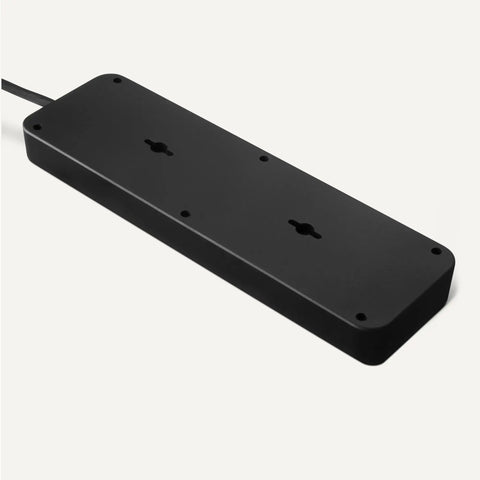 Slick Black Heavy Duty 12 Outlet Surge Protector Power Strip With 8 Foot Extension Cord And 4000 Joules Burst Guard shown from above, emphasizing flat design.