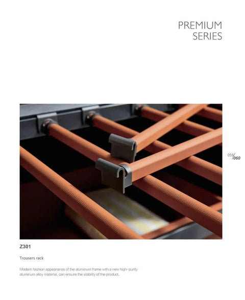 Smooth As Silk Slide Out Pant Rack For Clutter Free Closets Featuring Dead Simple Install And Generous Extra Large Capacity Finished In Bright Roman Orange for organizing trousers in a sleek aluminum frame.