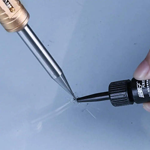 Close-up of Windshield Repair Kit For Chips And Cracks Easy Application Glass Crack Repair Tool with resin application on auto glass